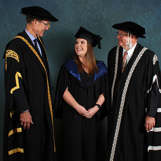 USC's 20,000th graduate Renee Barber chats with USC Chancellor Angus Houston and Vice-Chancellor Greg Hill