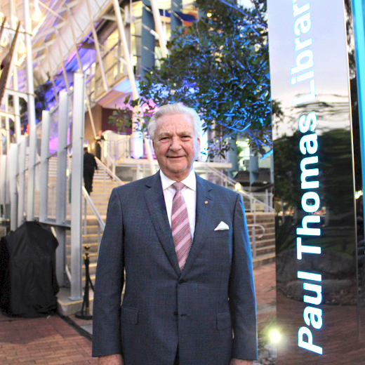 Former USC Vice-Chancellor Professor Paul Thomas outside the USC Library that is now named after him