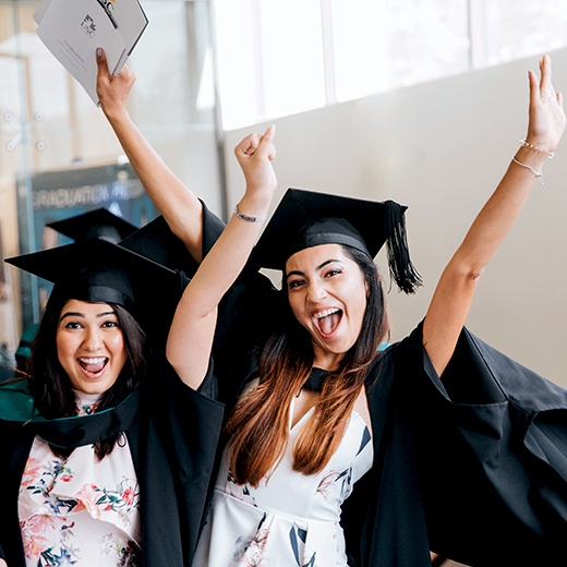 USC graduates celebrate after their graduation ceremony