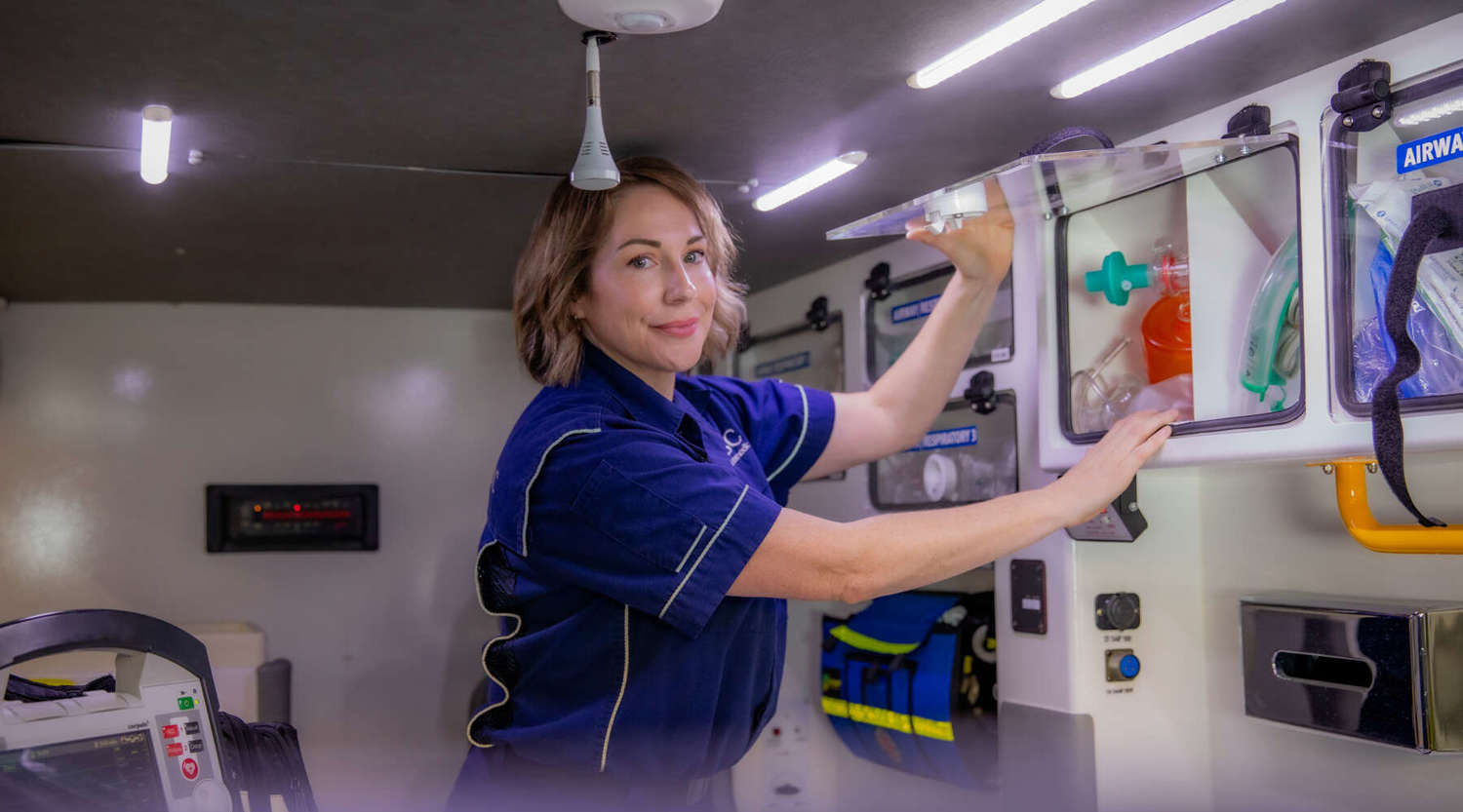 Paramedic Student Hayley Mailman inside an ambulance