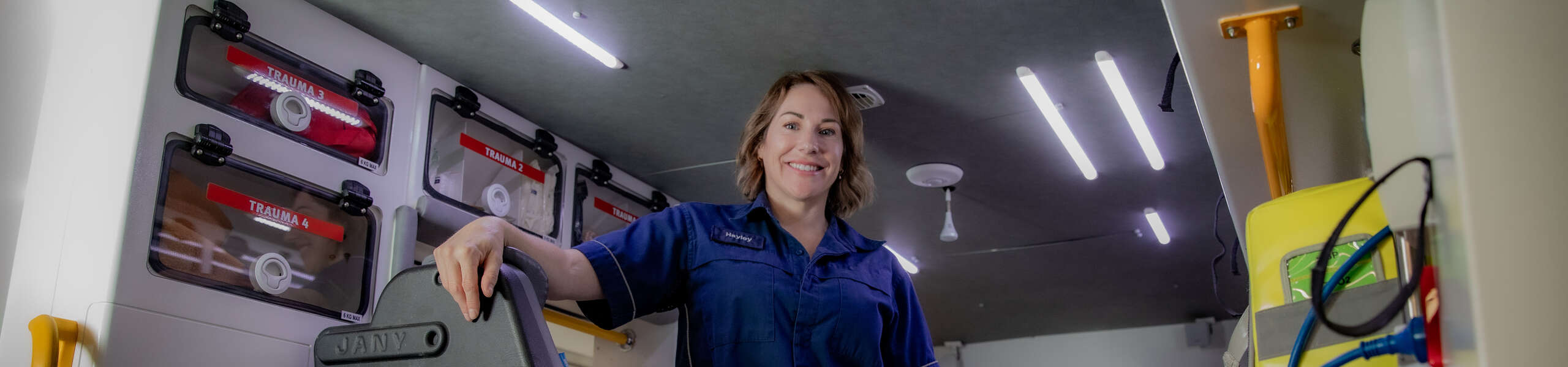 Paramedic Student Hayley Mailman inside an ambulance