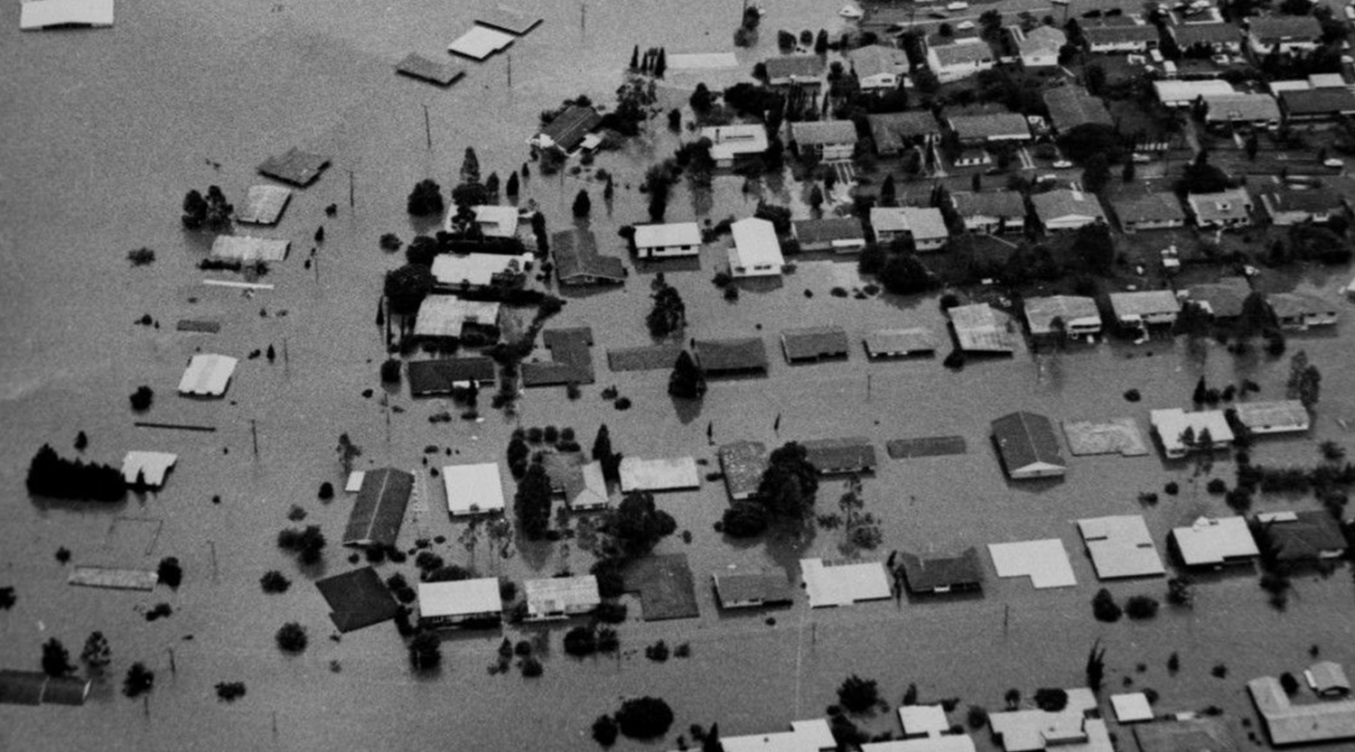 Aerial view of Brisbane in 1974 showing houses underwater 